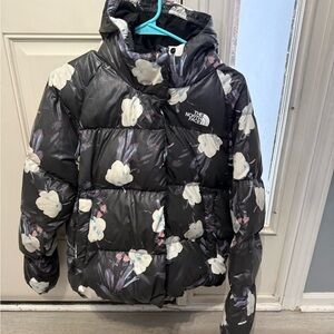 The North Face Girl’s Black, White, and Purple Floral Puffer Jacket